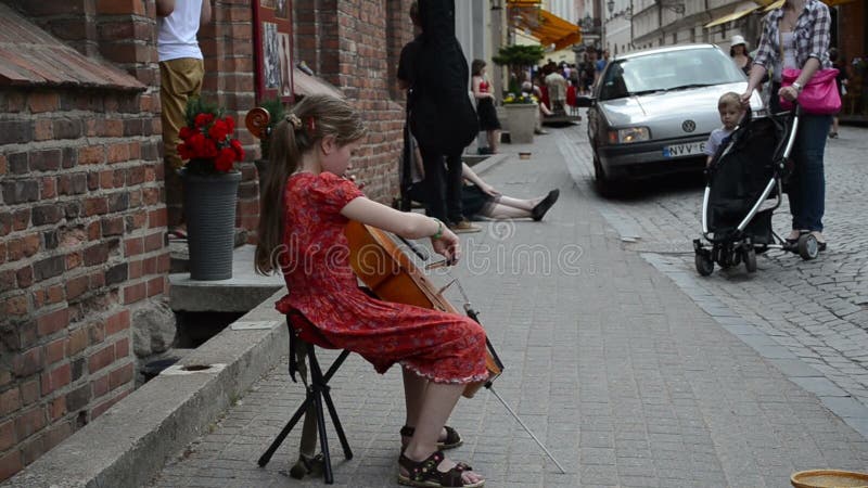 Young girl play cello