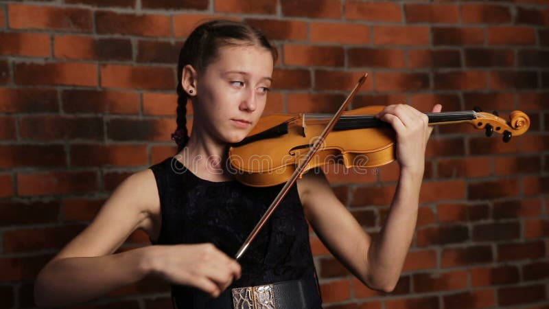 Young girl playing violin