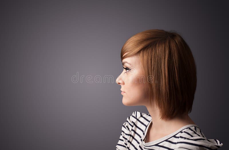 Young girl portrait thinking with copyspace stock photography