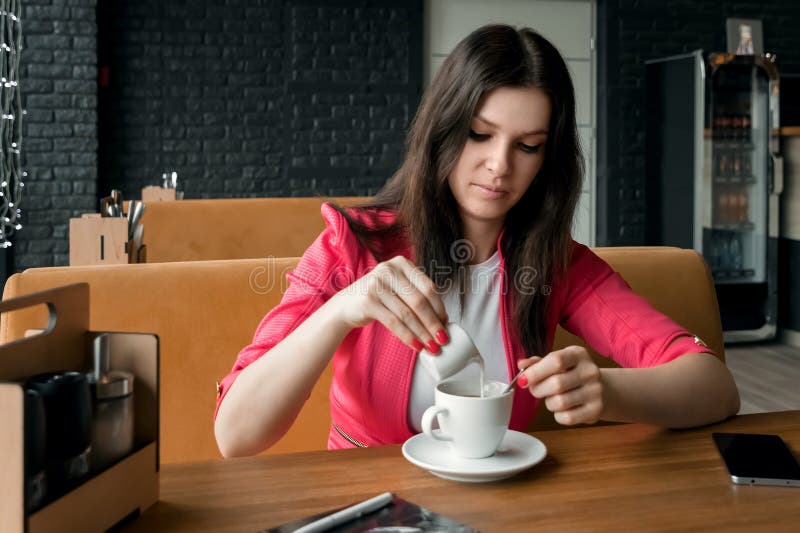 Pouring Cream Into A Coffee Stock Photo Image of 