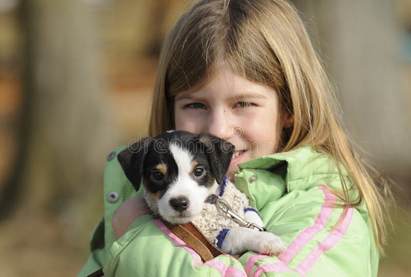 Young girl with puppy