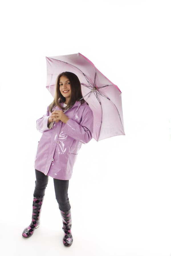 Young Girl In A Raincoat And Holding An Umbrella Stock Image Image