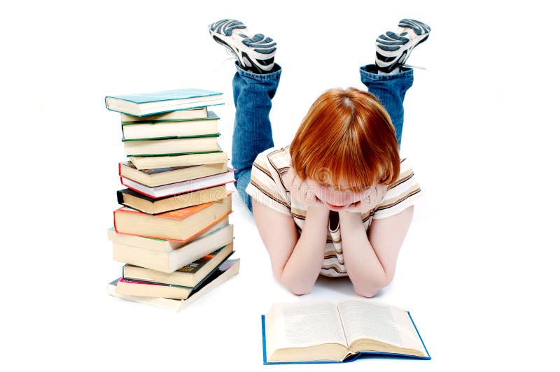 Young girl read the book on white