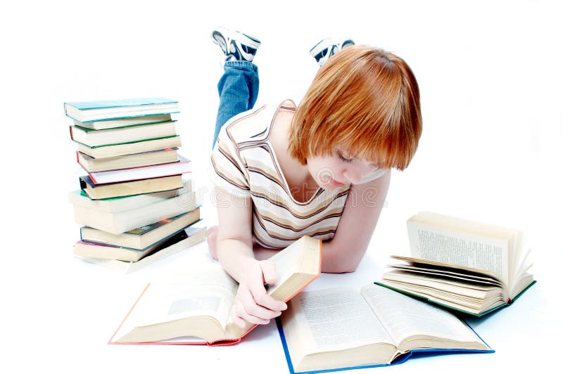 Young girl read the book on white