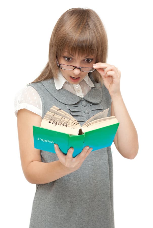 Young girl reads english and wonders