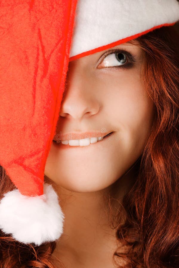 Young girl in santa claus hat