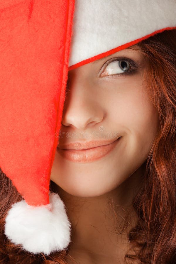 Young girl in santa claus hat