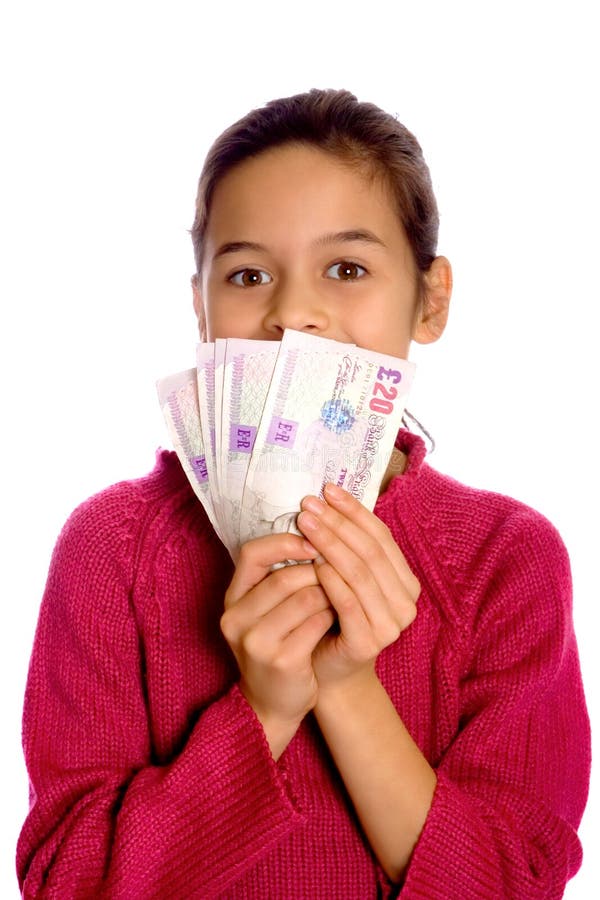 A young girl showing off a bunch of currency, isolated on white.