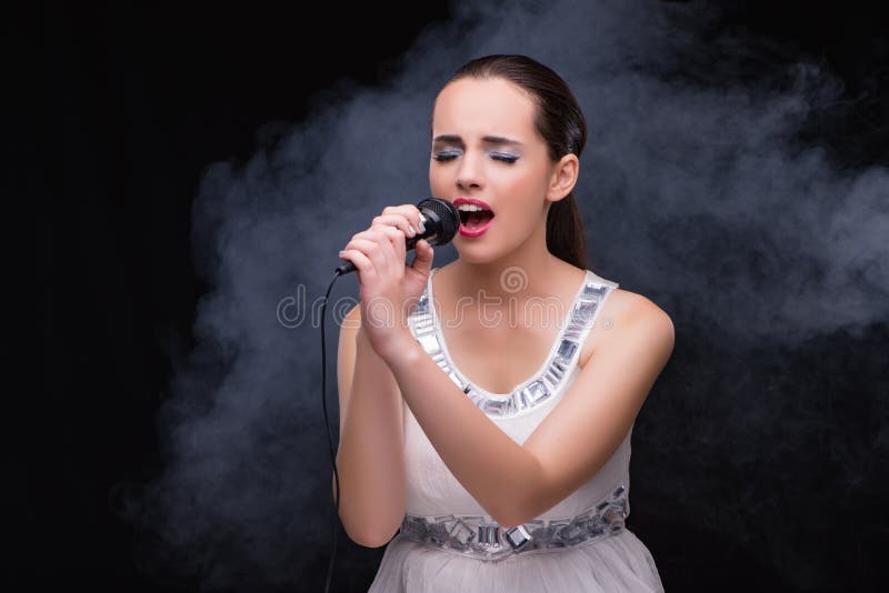 The Young Girl Singing in Karaoke Club Stock Photo Image of