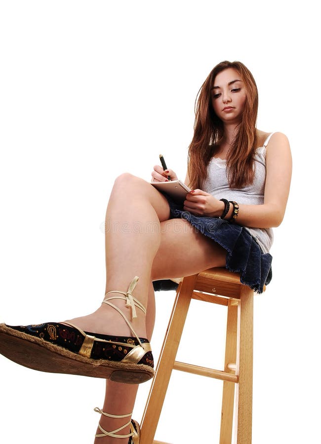 Young girl sitting.