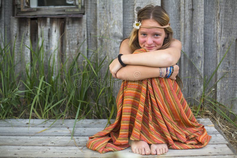 Young Girl Sitting Near the Village Houses. Holidays in the Village ...