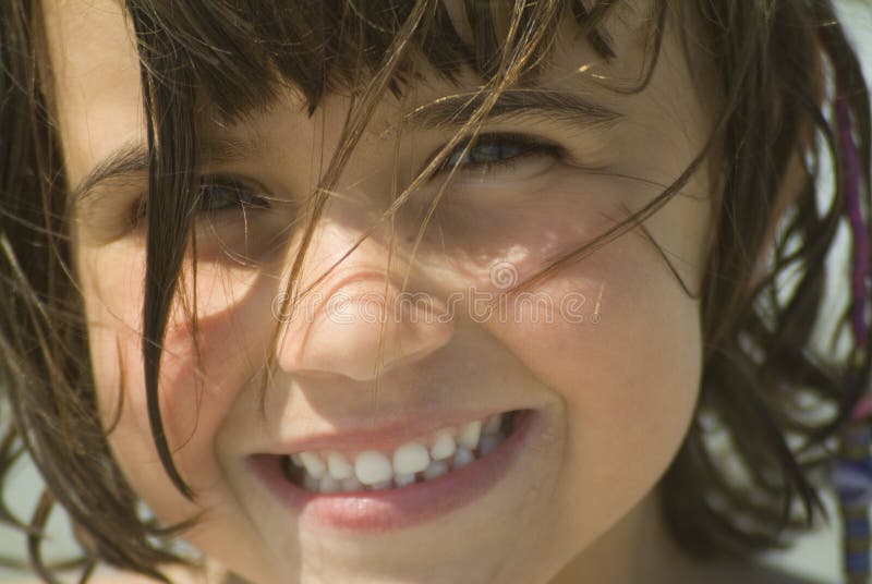 Young girl smiling at the camera