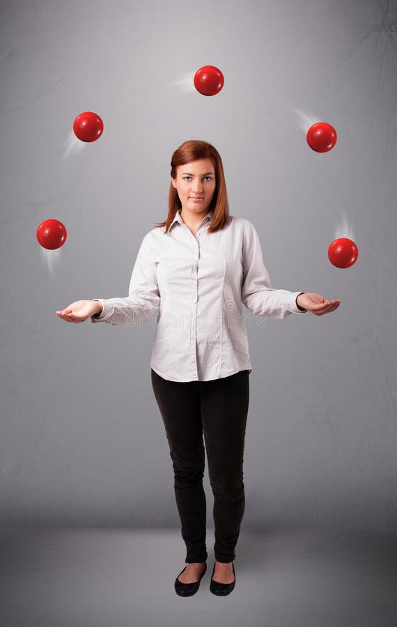 Young Girl Standing and Juggling with Red Balls Stock Photo Image of