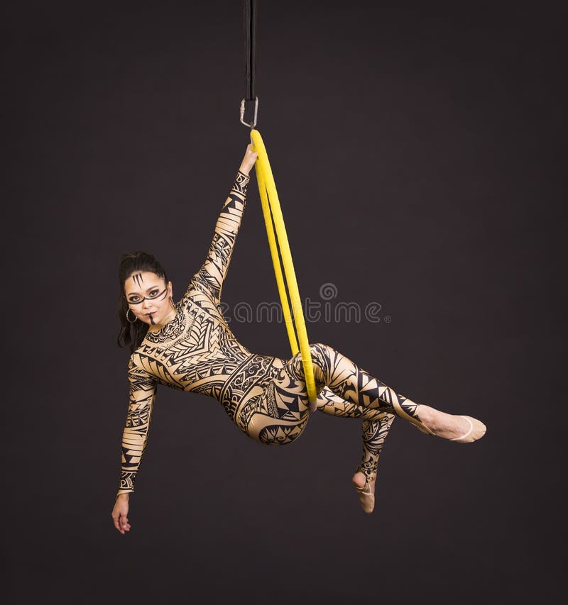 young girl suit print performs acrobatic elements air ring young girl suit print performs 146862435