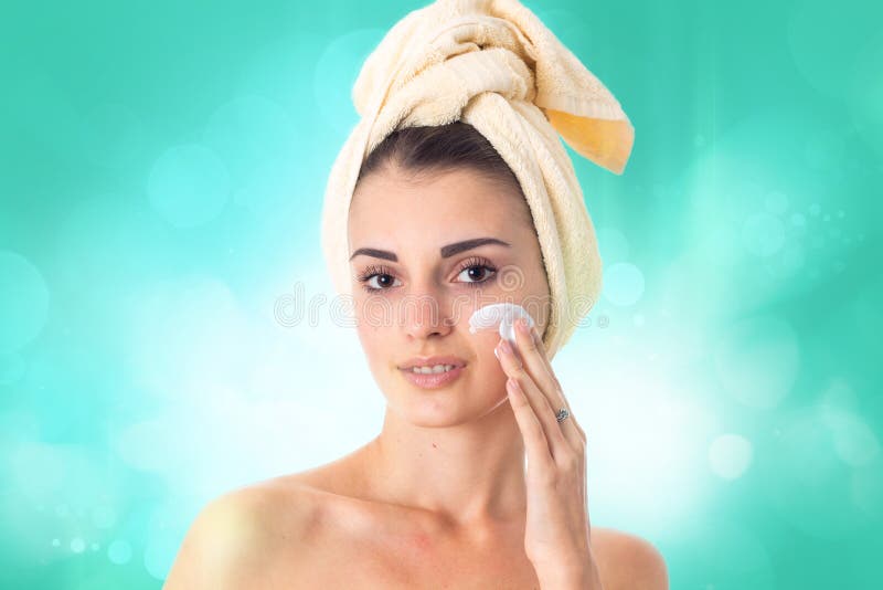 Young girl takes care her skin.