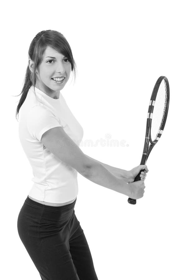 Young girl with a tennis racket stock photography