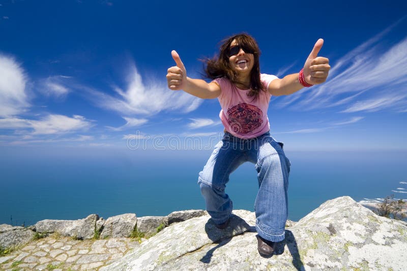 Young girl with thumbs up