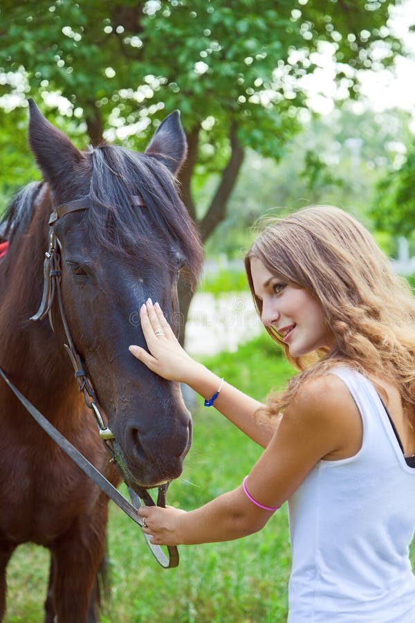 Young girl to train a horse.