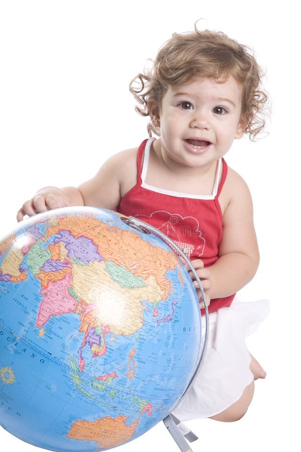 Young girl touching a world globe map