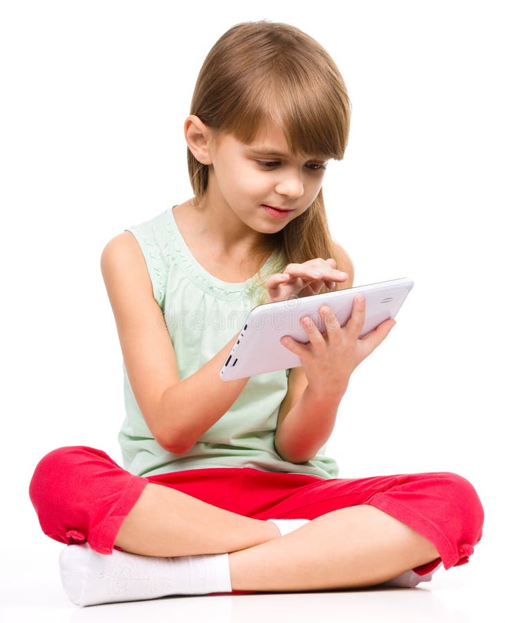 Young girl is using tablet stock image. Image of peaceful 46619759