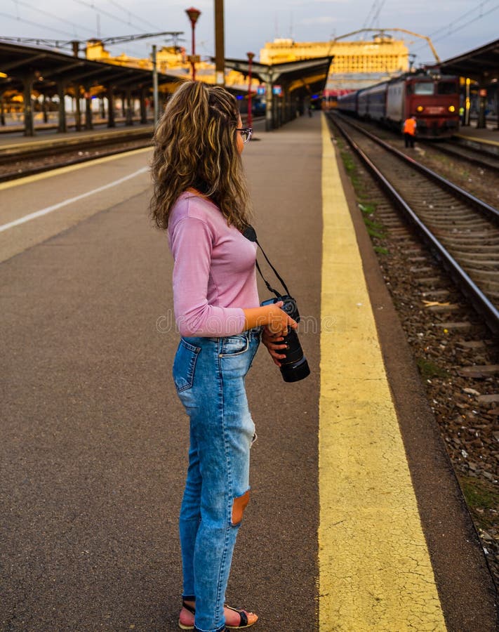 Young Girl Laying On A Railway Against Summer Landscape Hoodoo Wallpaper 