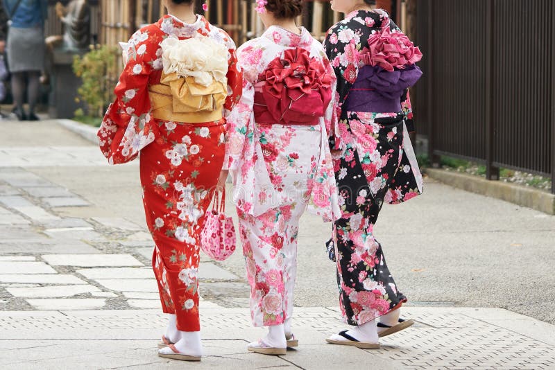 Young Girl Wearing Japanese Kimono Standing in Front of Sensoji Temple ...