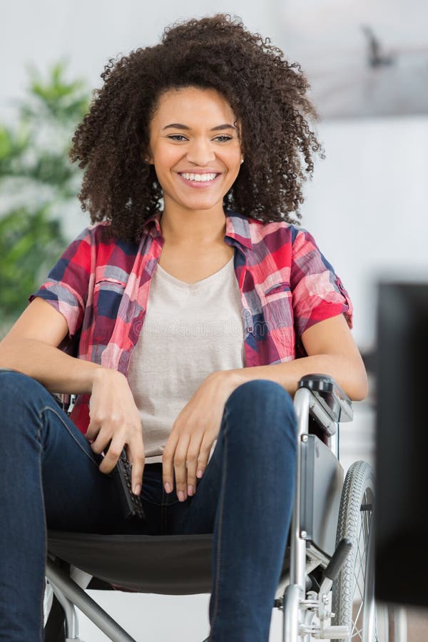 Young girl in wheelchair stock photo