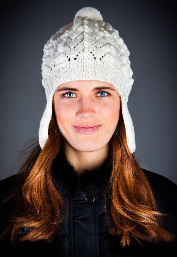 Young Girl in a Winter Cap on the Dark Stock Photo Image of female
