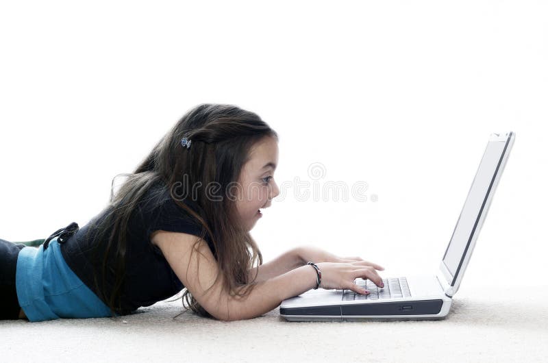 Young girl working on laptop