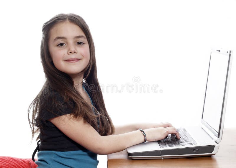 Young girl working on laptop