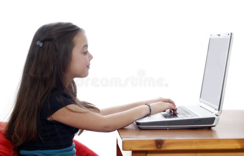 Young girl working on laptop