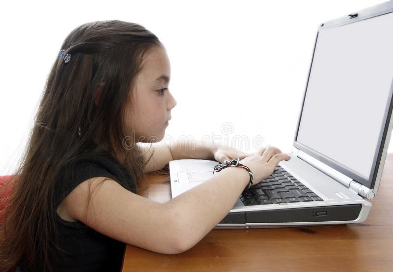 Young girl working on laptop