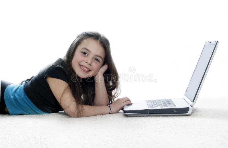 Young girl working on laptop