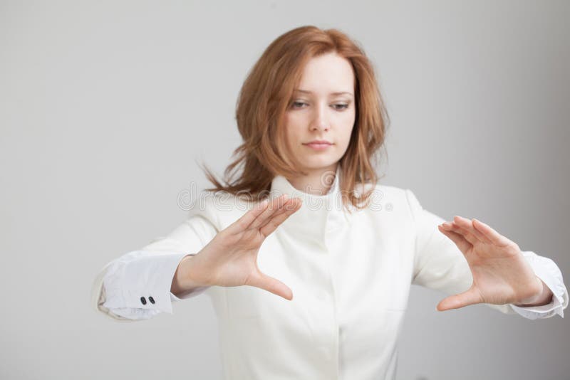 Young girl working with virtual screen stock photos