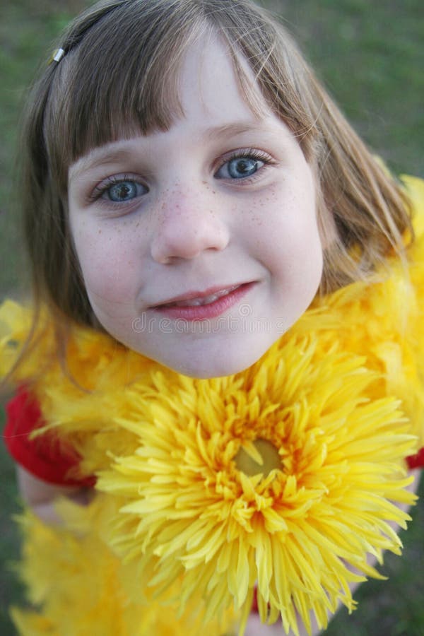 Young Girl With Yellow Flower Picture. Image 2087686