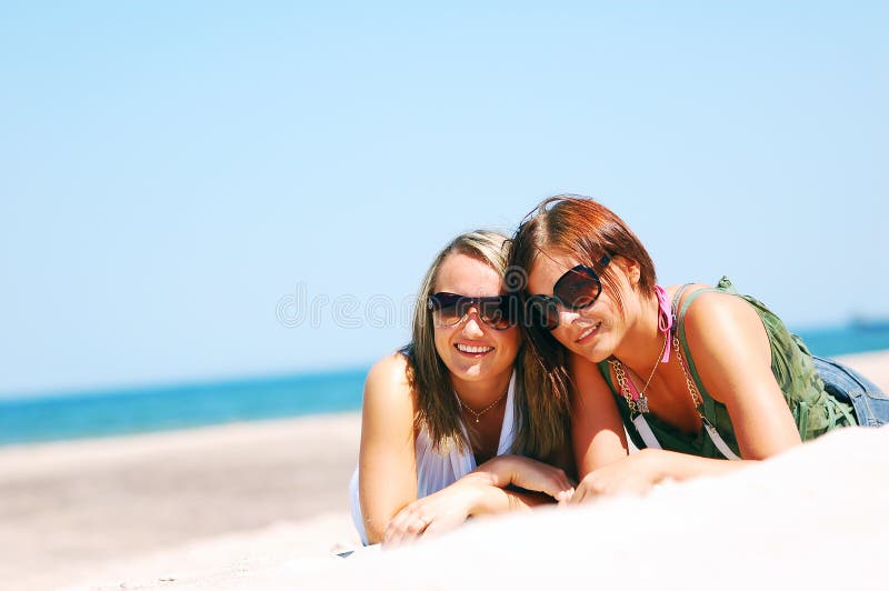 Young girls on the summer beach