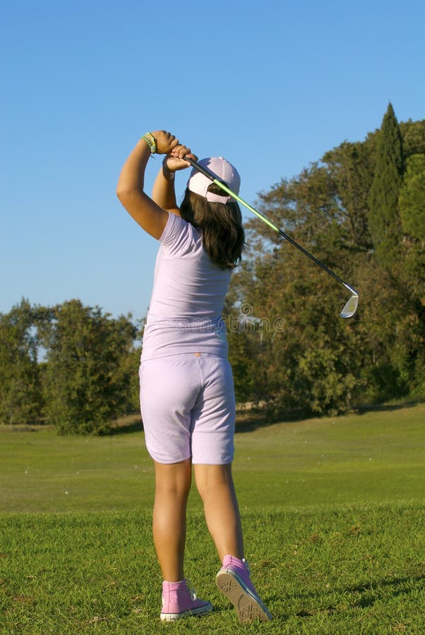 Young golf player trying a shot. Day game drive stock images, royalty-free photos and pictures