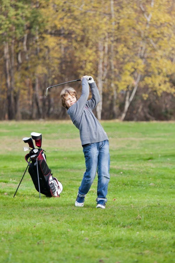 Young golfer swing