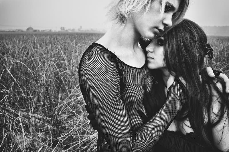 Young goth couple outdoors