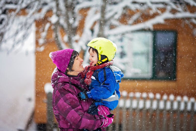 Young grandmother and her little toddler grandson, playing in th stock photography Young grandmother and her little toddler grandson, playing in th stock photography