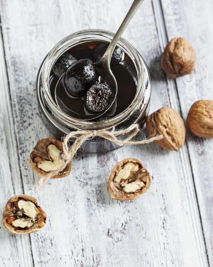 Young Green walnut jam stock images