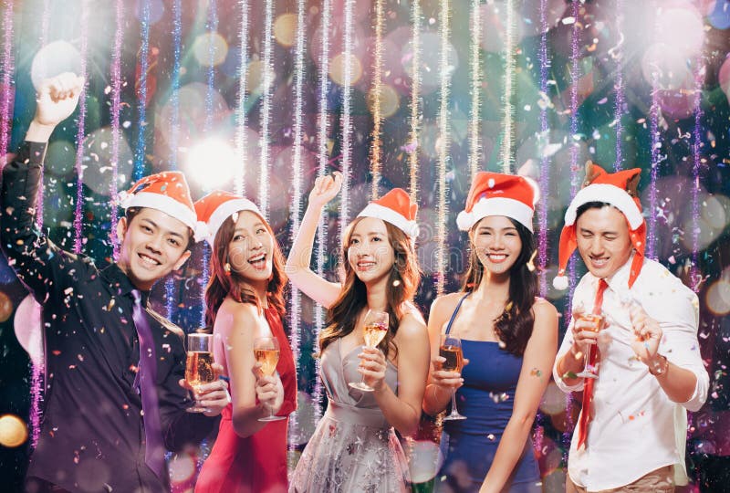 Young group having fun in christmas party stock image Young group having fun in christmas party stock image