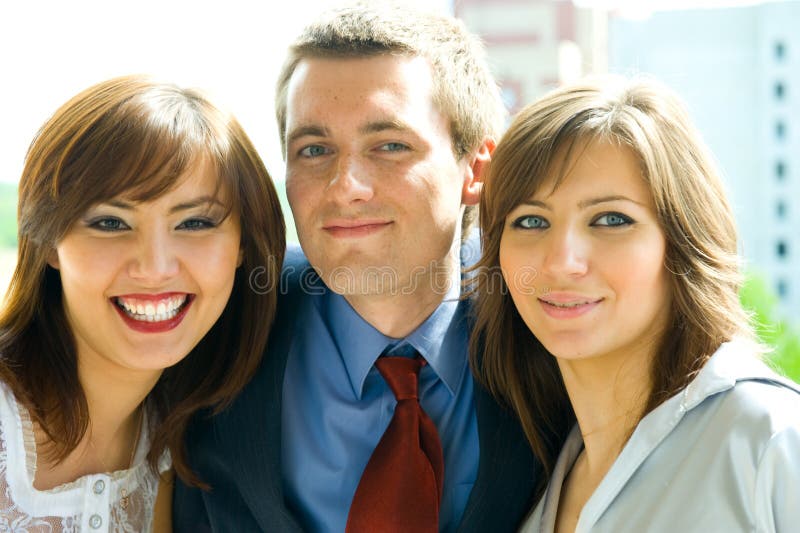 The young group of smiling business people