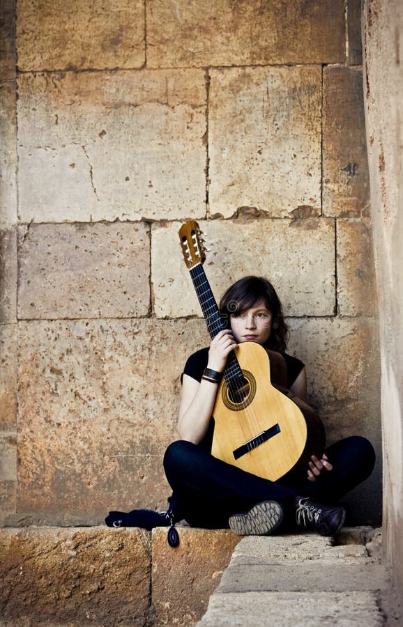 Young guitar performer