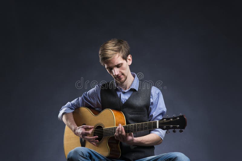 Handsome guitar player stock image. Image of music, serenade 5627585