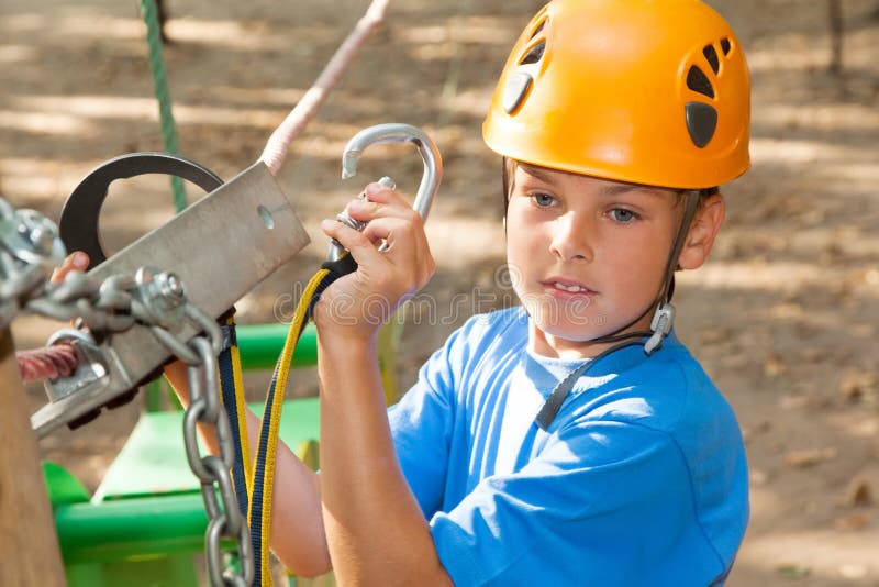 Guy with Equipment Climber Engages the Anchor. Stock Photo Image of