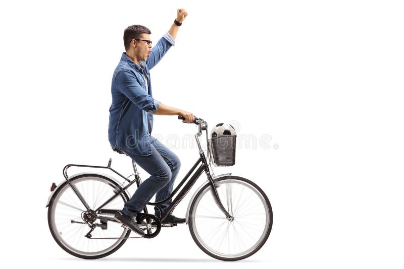 Young Guy with a Football Riding a Bike and Gesturing Happiness Stock ...