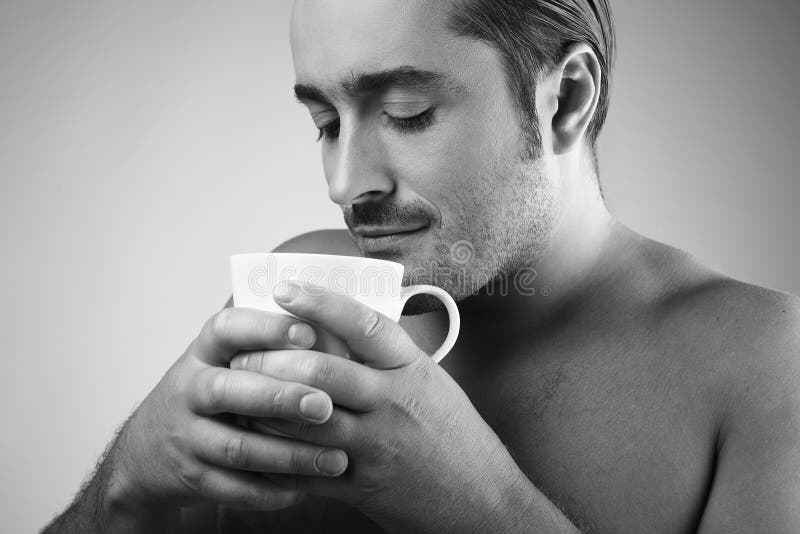 Young Guy Having a Cup of Coffee Stock Image Image of gray, drink