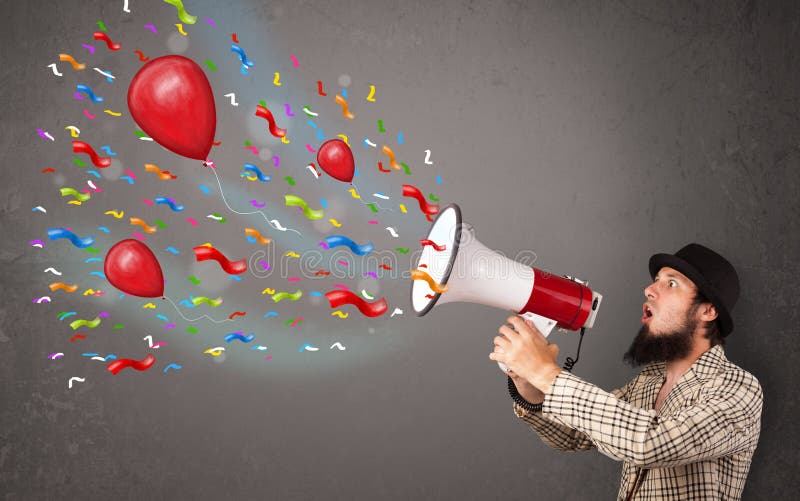 Young Guy Having Fun, Shouting into Megaphone with Balloons Stock Image