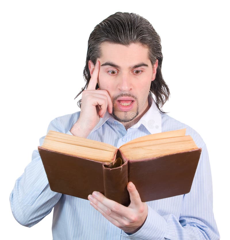 Young guy looks into book and thinks isolated